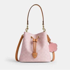 Coach powder pink Rowan bucket bag 2026 release sold out authentic